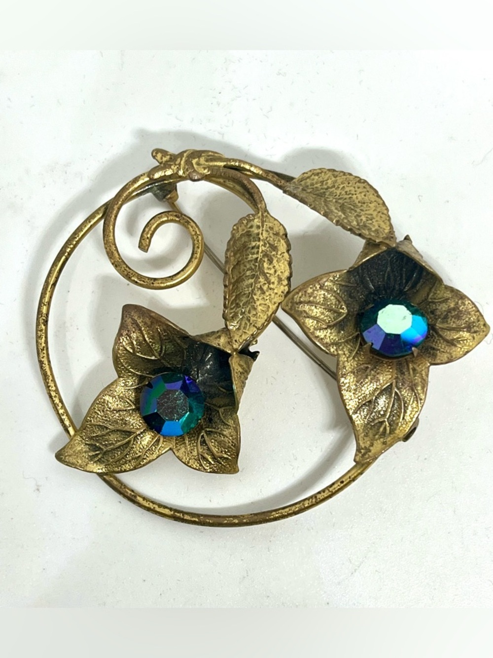 Vintage Gold-Tone Floral Brooch with Blue-Green Aurora Rhinestones